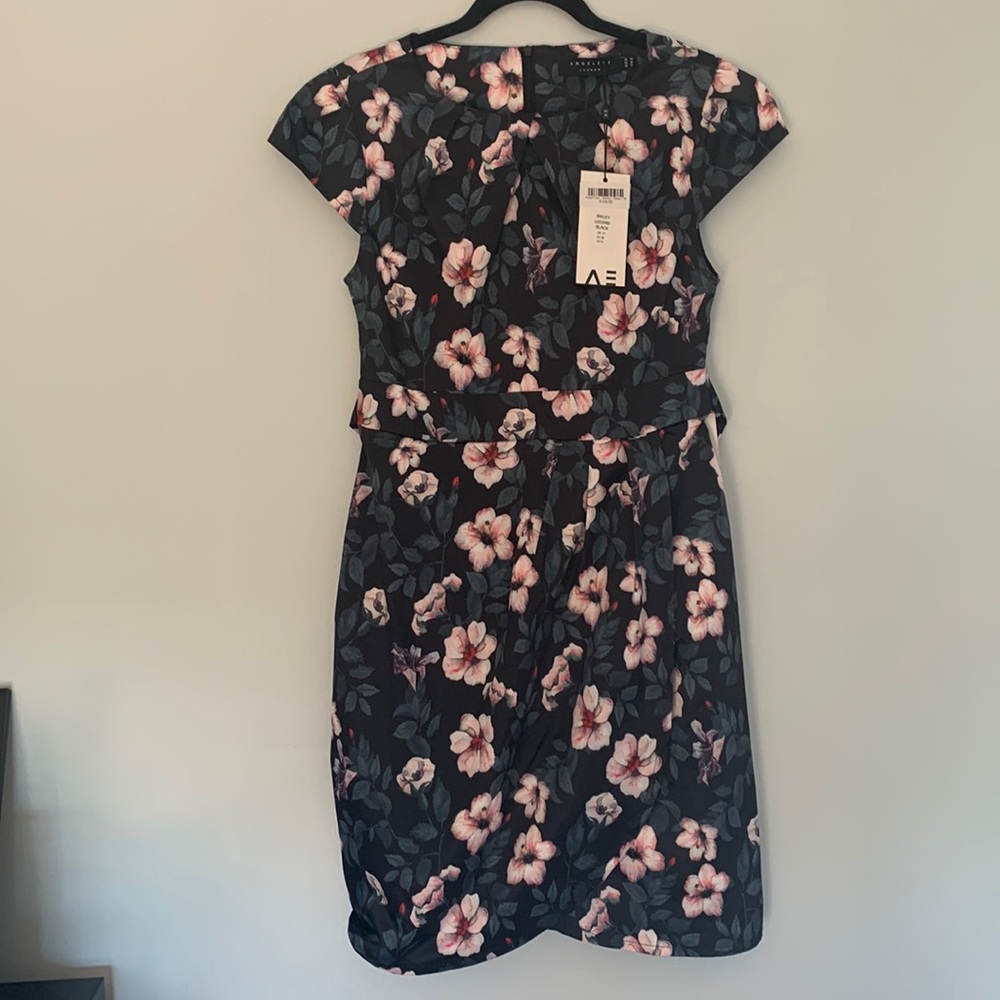 NWT Angel Eye London dress. Size medium. Comfy and cute.